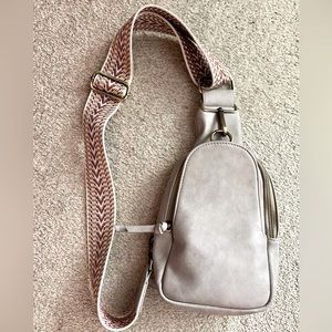 Anthropologie - Urban Originals - Liberty Sling Bag. Gently used, pale grey